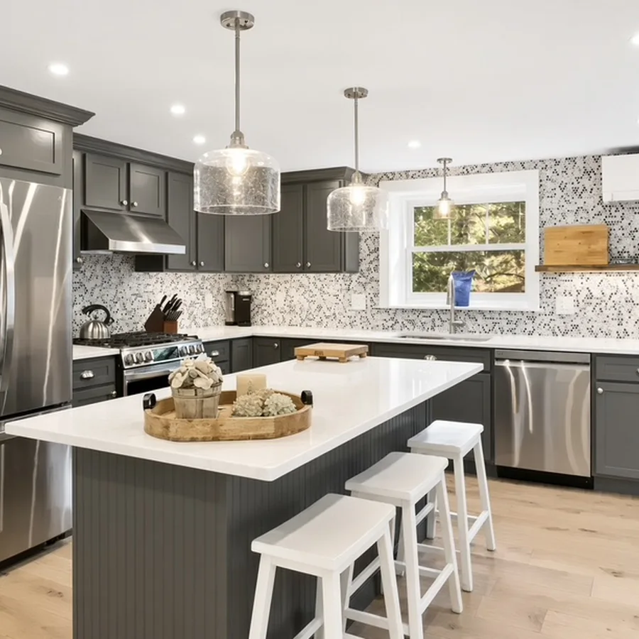 White kitchen with decorative tile inset above a gas range
